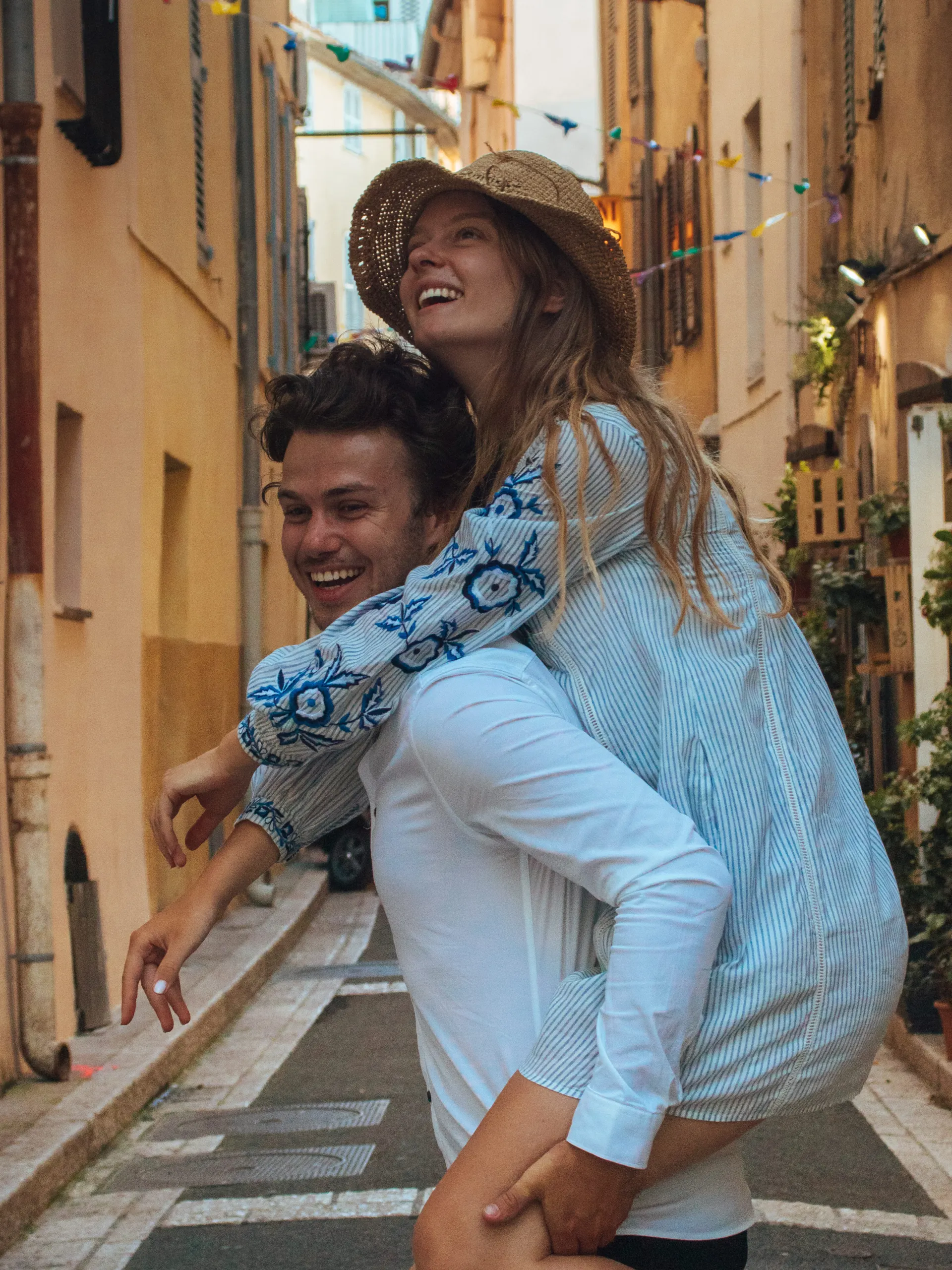 Couple in Antibes, France, our favorite village to visit in the Provence